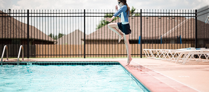 image of custom pool fencing around pool
