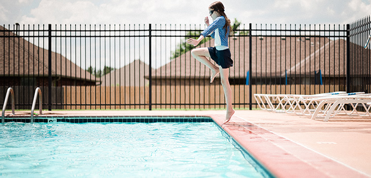 image of custom pool fencing around pool